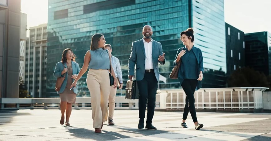 Attendees walking towards their upcoming meeting